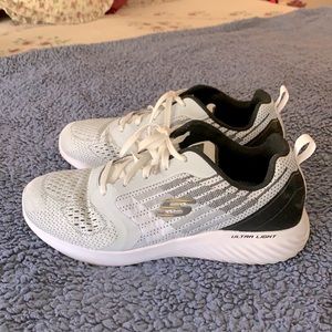 Pair Skechers shoes